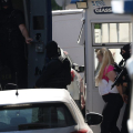 Προθεσμία για την Τρίτη έλαβε η 46χρονη που εκδόθηκε για τον εμπρησμό της Marfin - Παραμένει στη ΓΑΔΑ μέχρι την απολογία της.