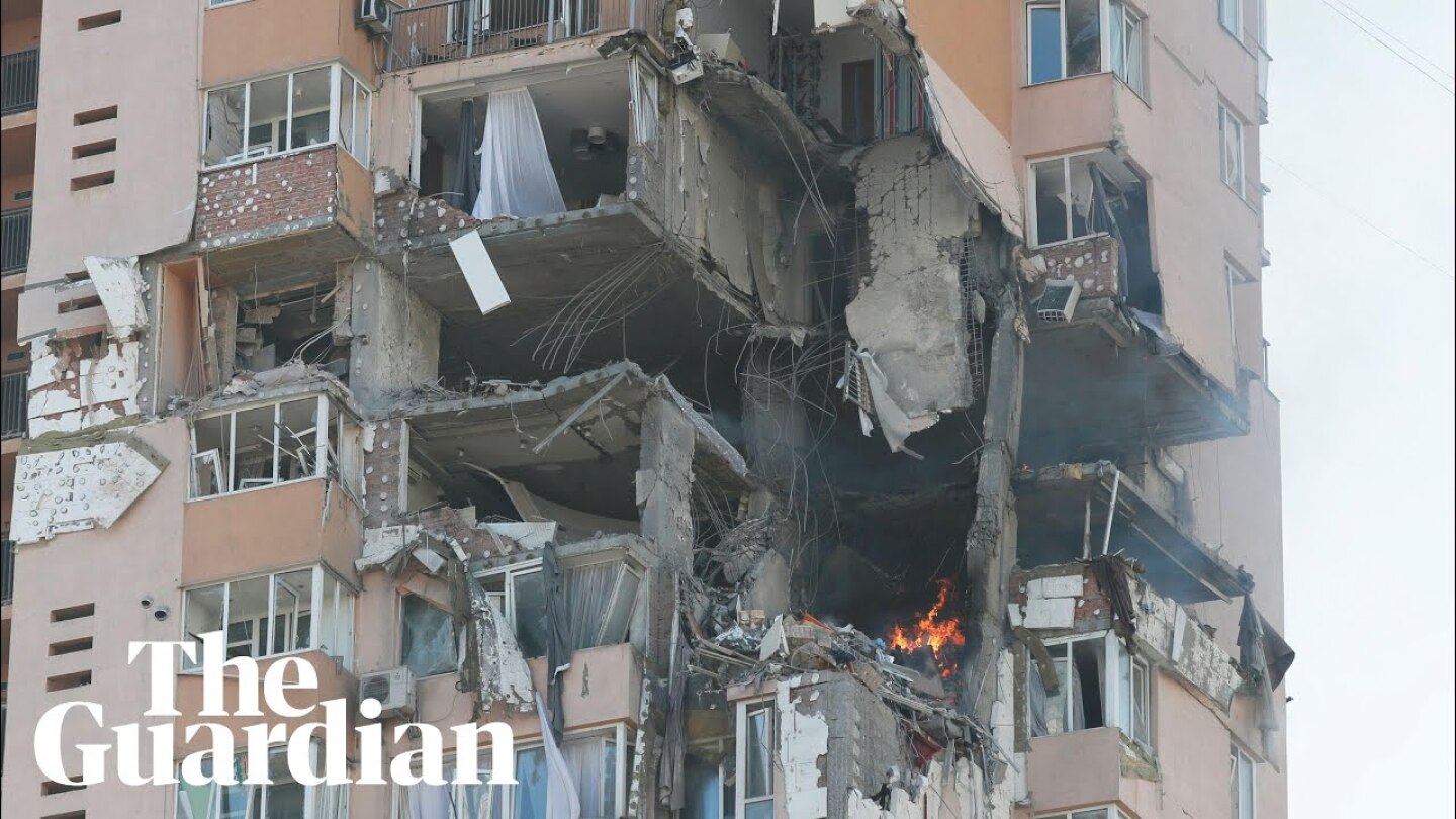 Kyiv apartment building hit as Ukrainians fight off Russian attacks across the country