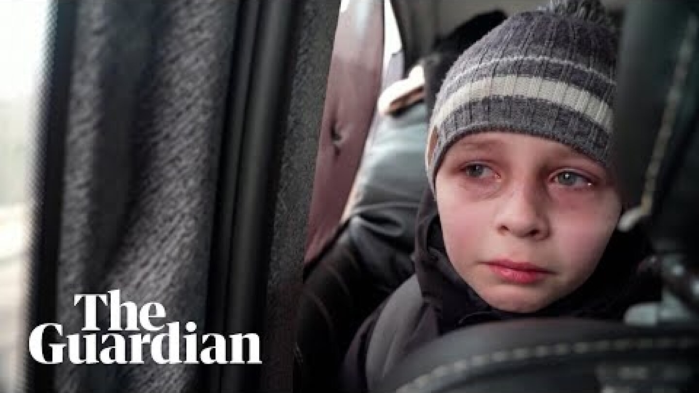 'We left our Dad in Kyiv': young Ukrainian boy in tears after fleeing capital