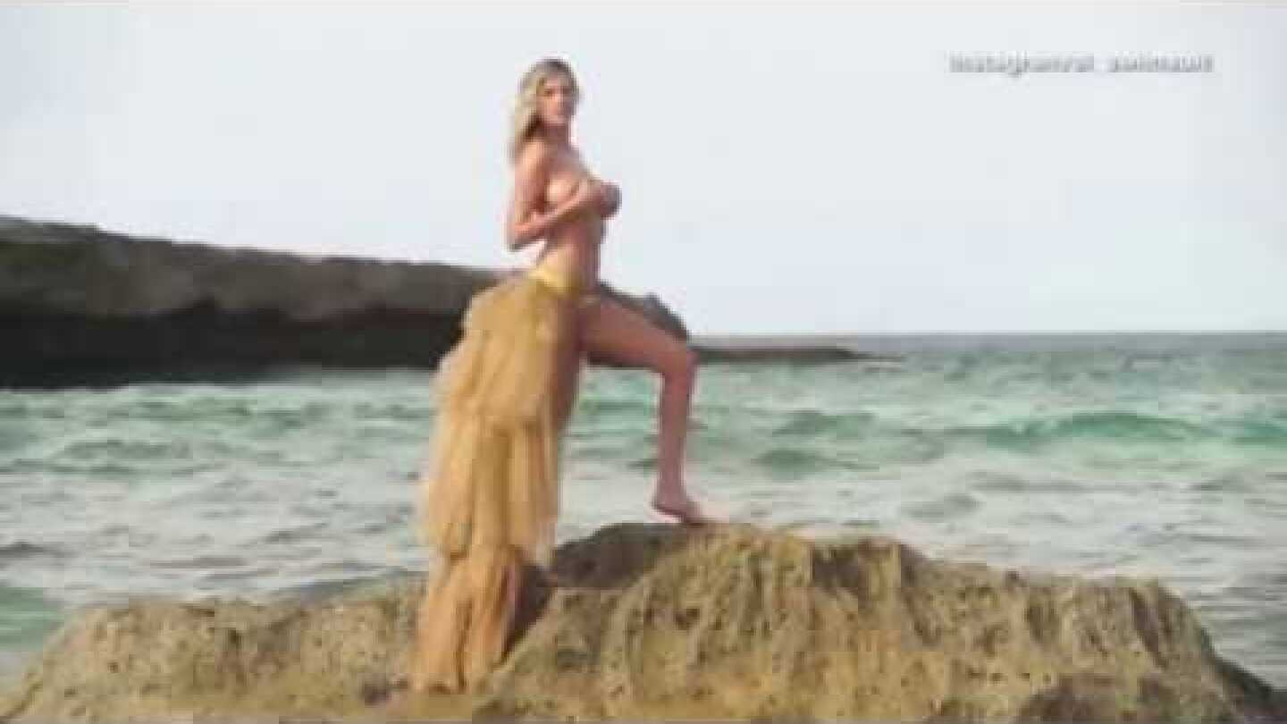 Moment Kate Upton got swept off rock during photoshoot