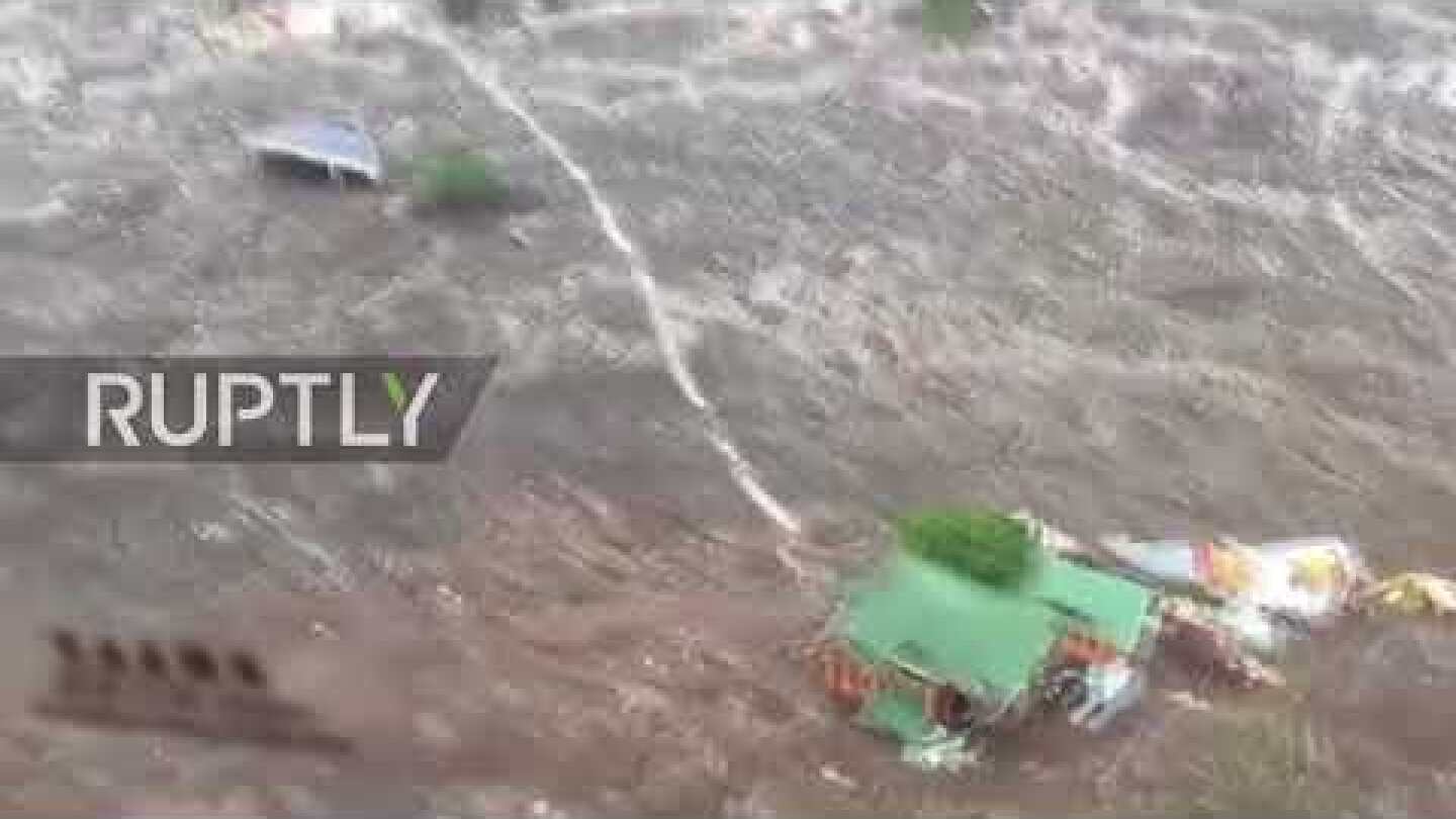 Chile: Aerial footage of village buried under deadly landslide