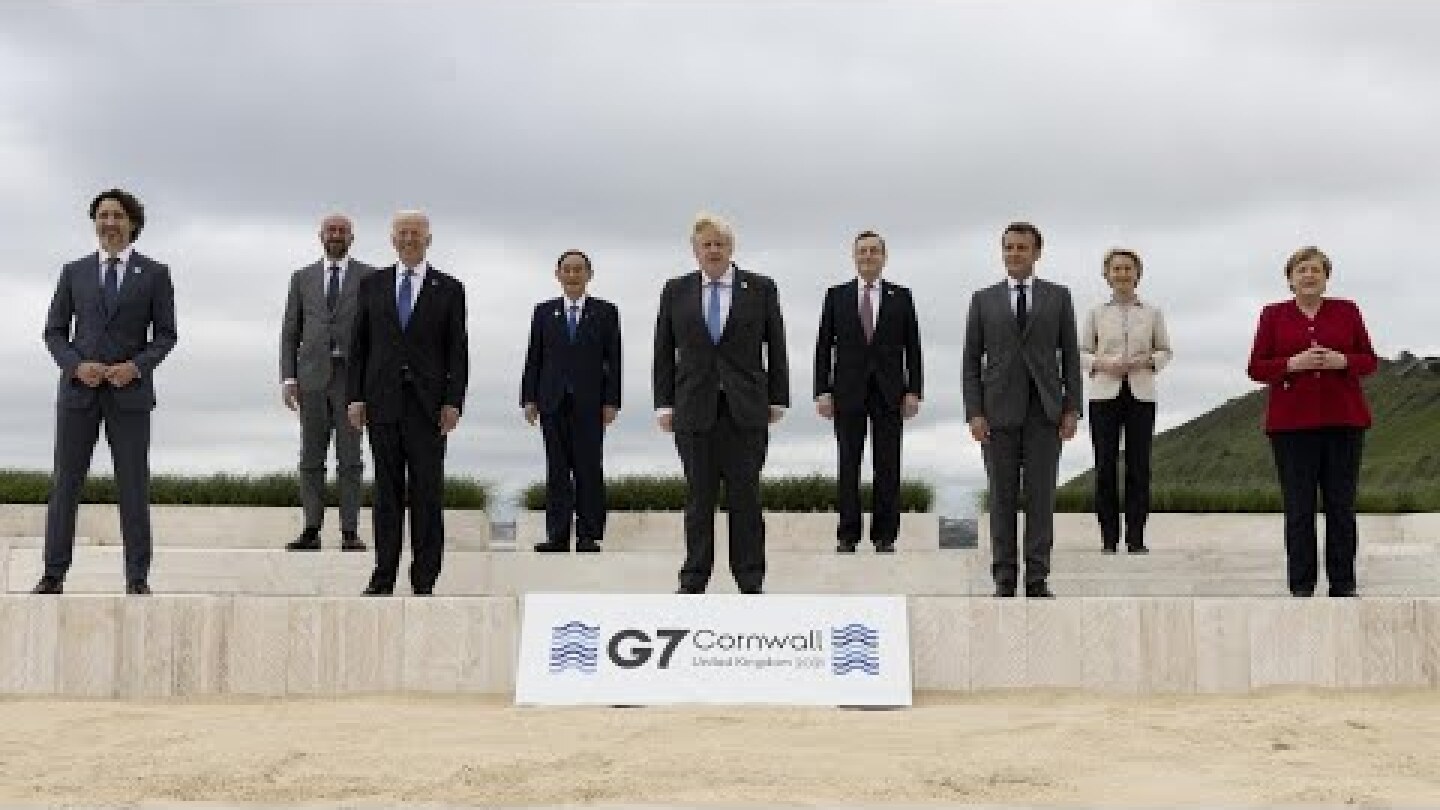 G7 leaders pose for family photo at start of summit in Cornwall