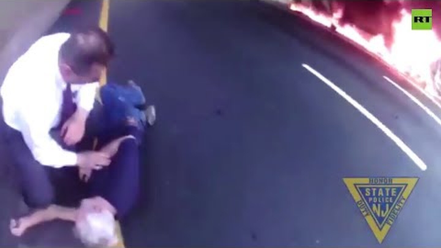 Seconds before explosion | Cops pull man out of burning truck