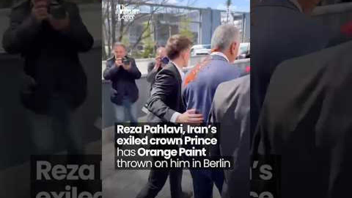 Reza Pahlavi, Iran's exiled crown Prince has Orange Paint thrown on him in Berlin