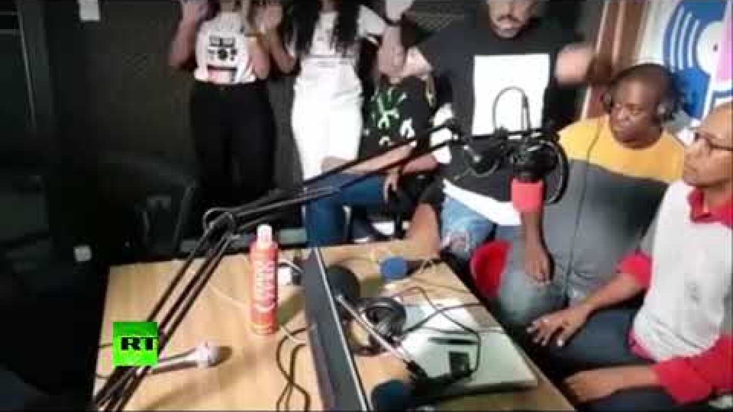 Robbery on air: Moment armed thieves raid Brazilian radio show studio while it’s broadcasting