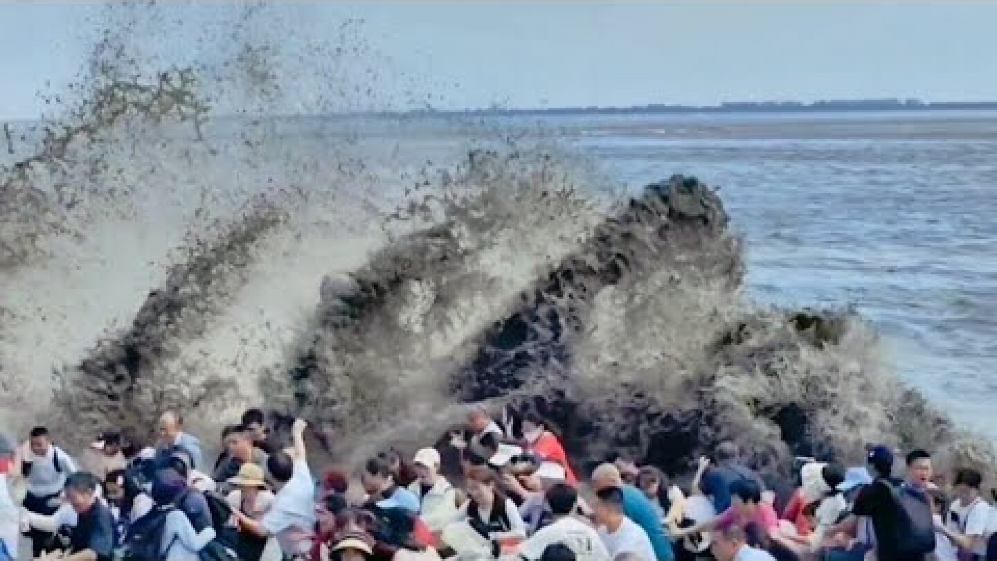 Giant wave like tsunami hit China! Powerful tidal bore surges up Qiantang river