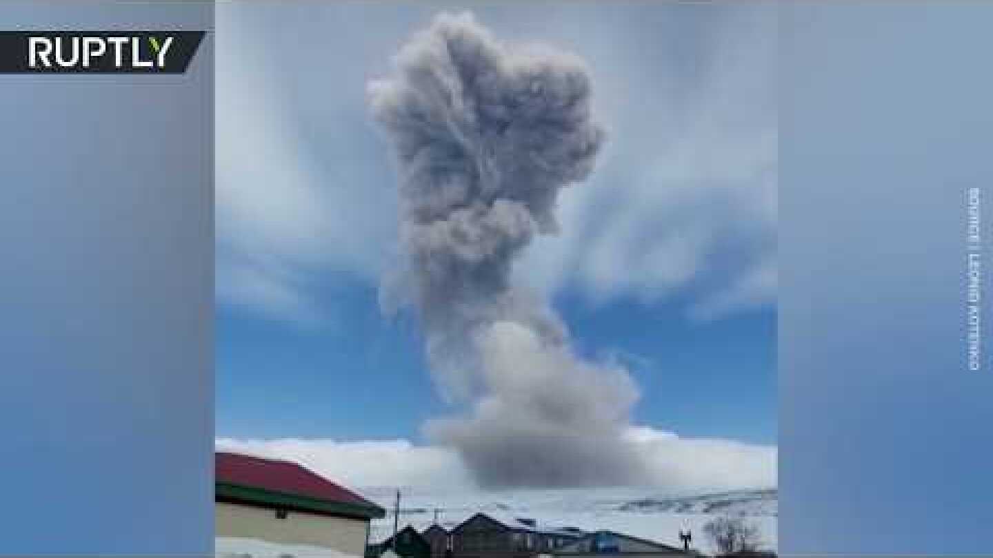 Pitch-black landscape: Volcano covers Russian city in the Kurils' with ash