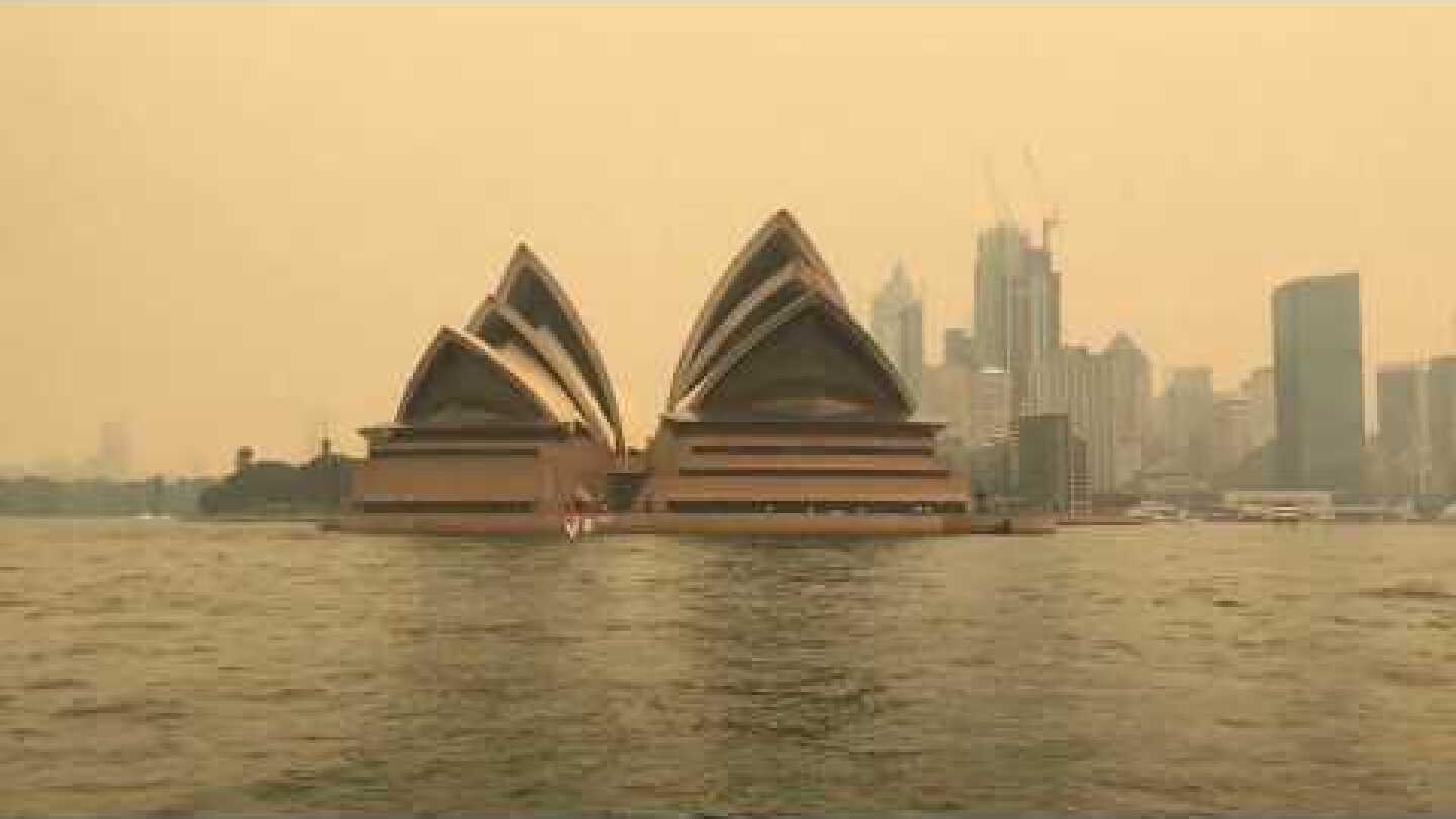 Bushfires Leave Sydney Harbour in Red 'Smoke Haze'