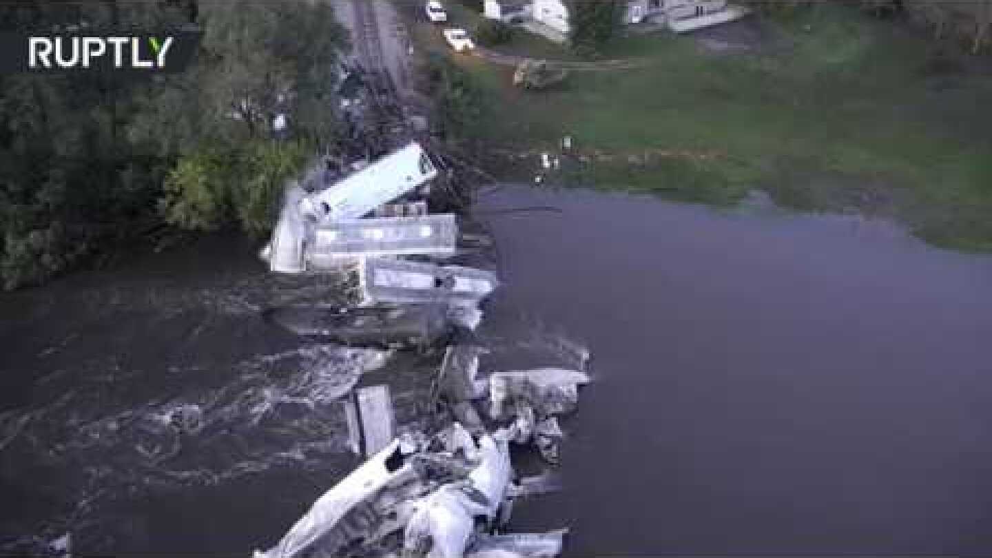 Freight train plummeted into Floyd river after bridge collapse in Iowa