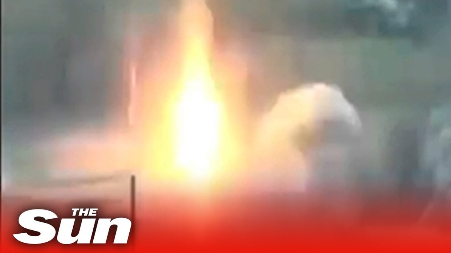 Ukrainian 'kamikaze' drone SMASHES into a Russian tank turning it into fireball