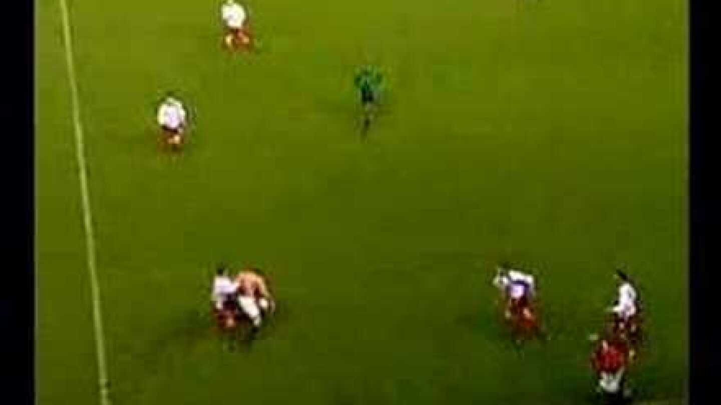 Diego Forlan can't get his shirt back on- goal celebration