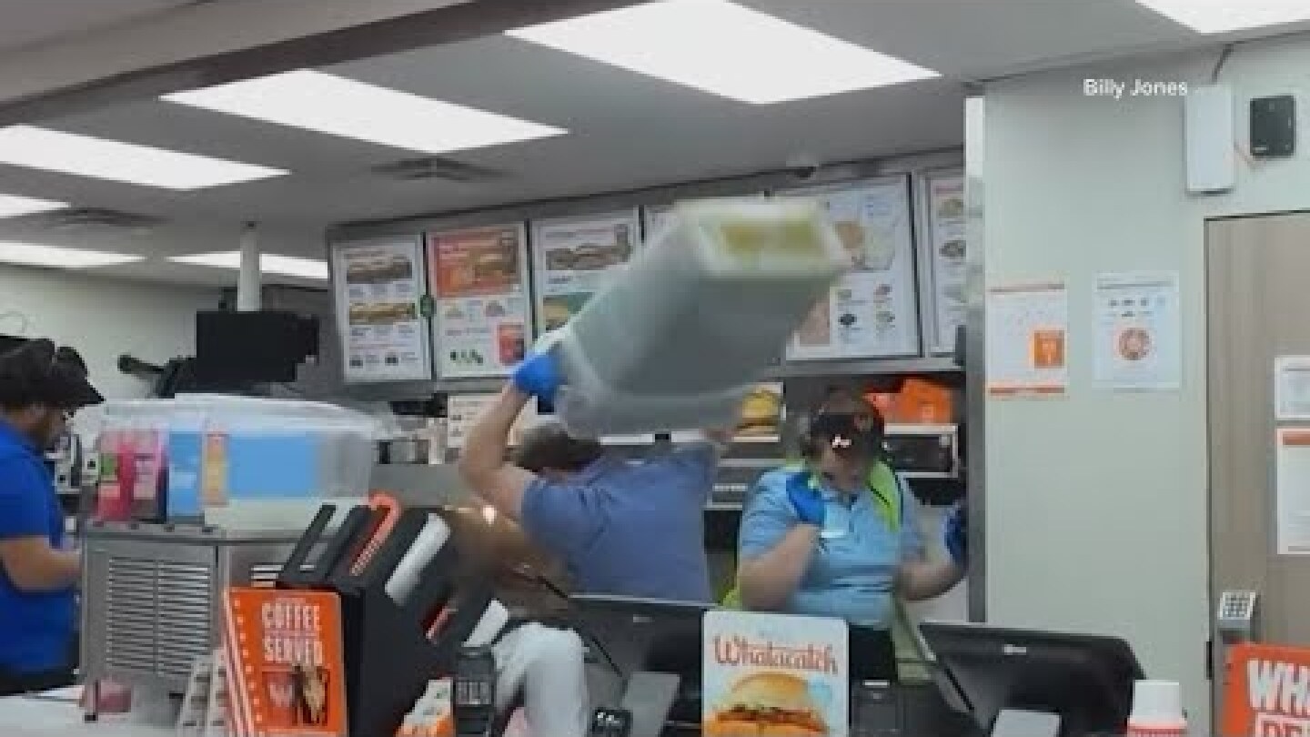 Whataburger manager takes down angry customer with a trash can