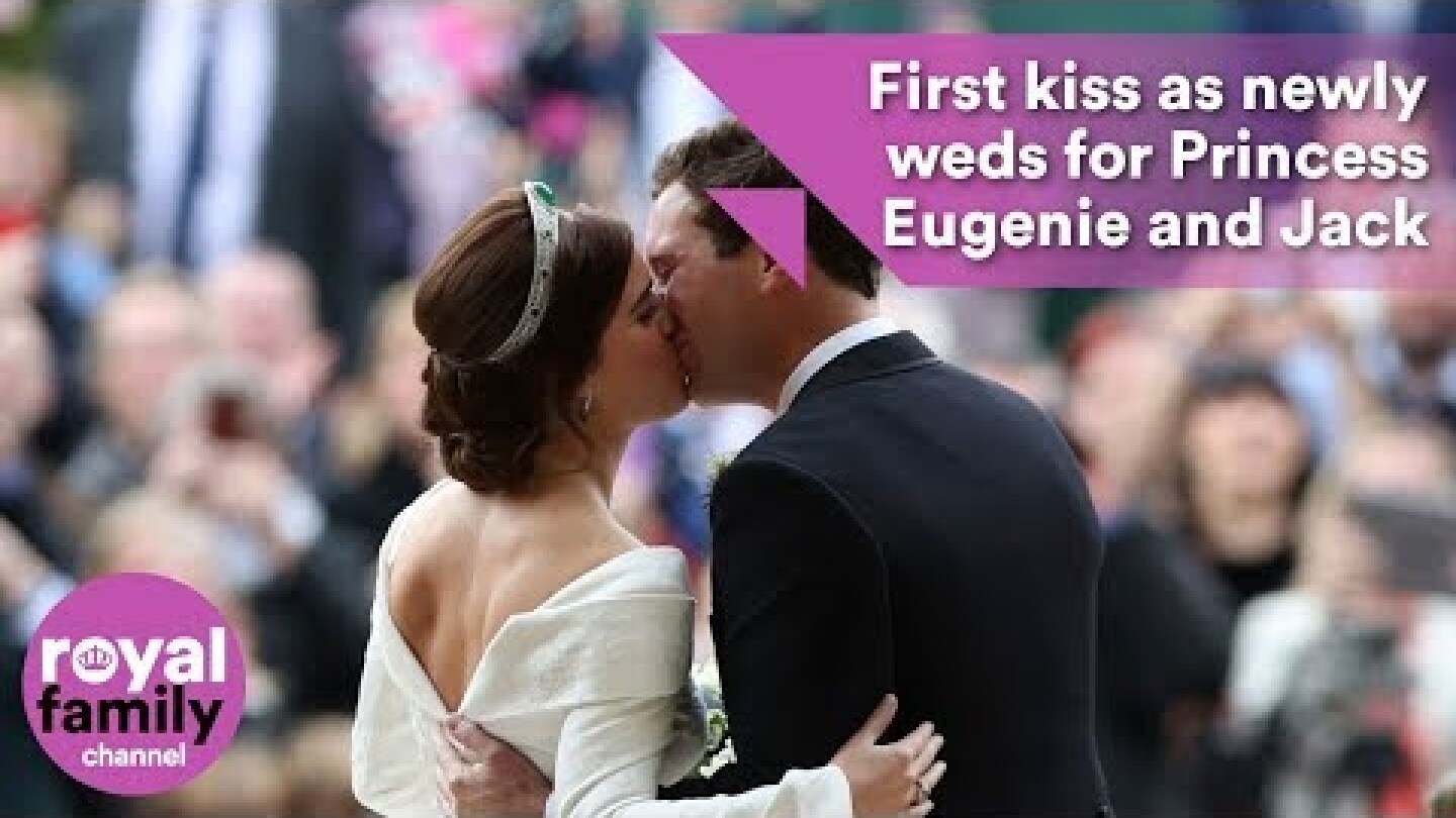 Princess Eugenie and Jack Brooksbank kiss on steps after wedding ceremony