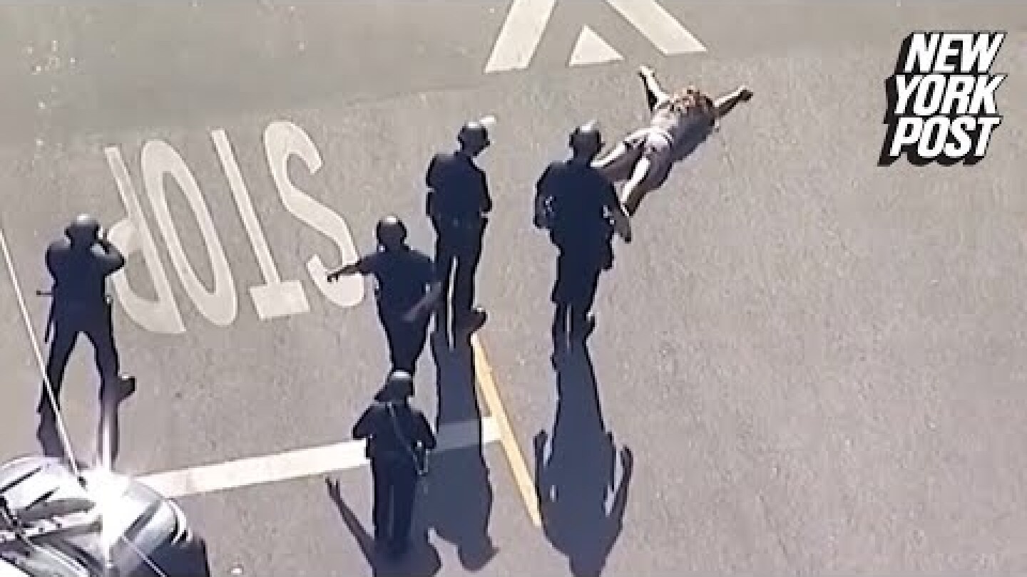 Jillian Lauren, wife of Weezer bassist Scott Shriner, shot after pointing a gun at police