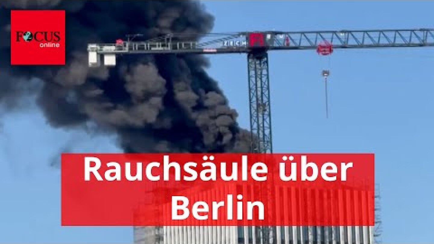 Hochhaus brennt mitten in Berlin - riesige Rauchsäule über der Stadt
