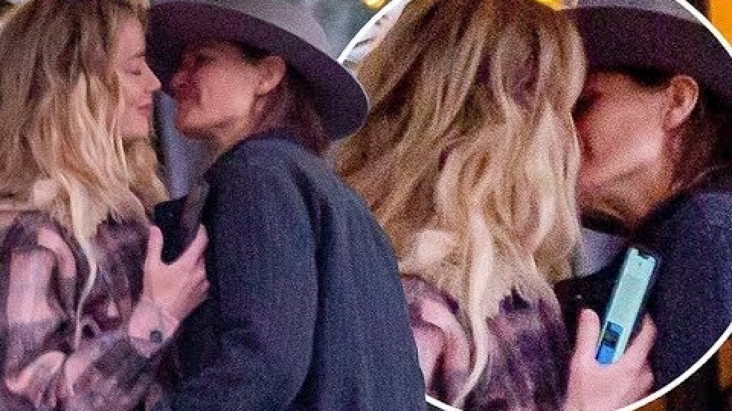 EXCLUSIVE: Amber Heard passionately kisses new woman during hot and heavy weekend away... as she mov