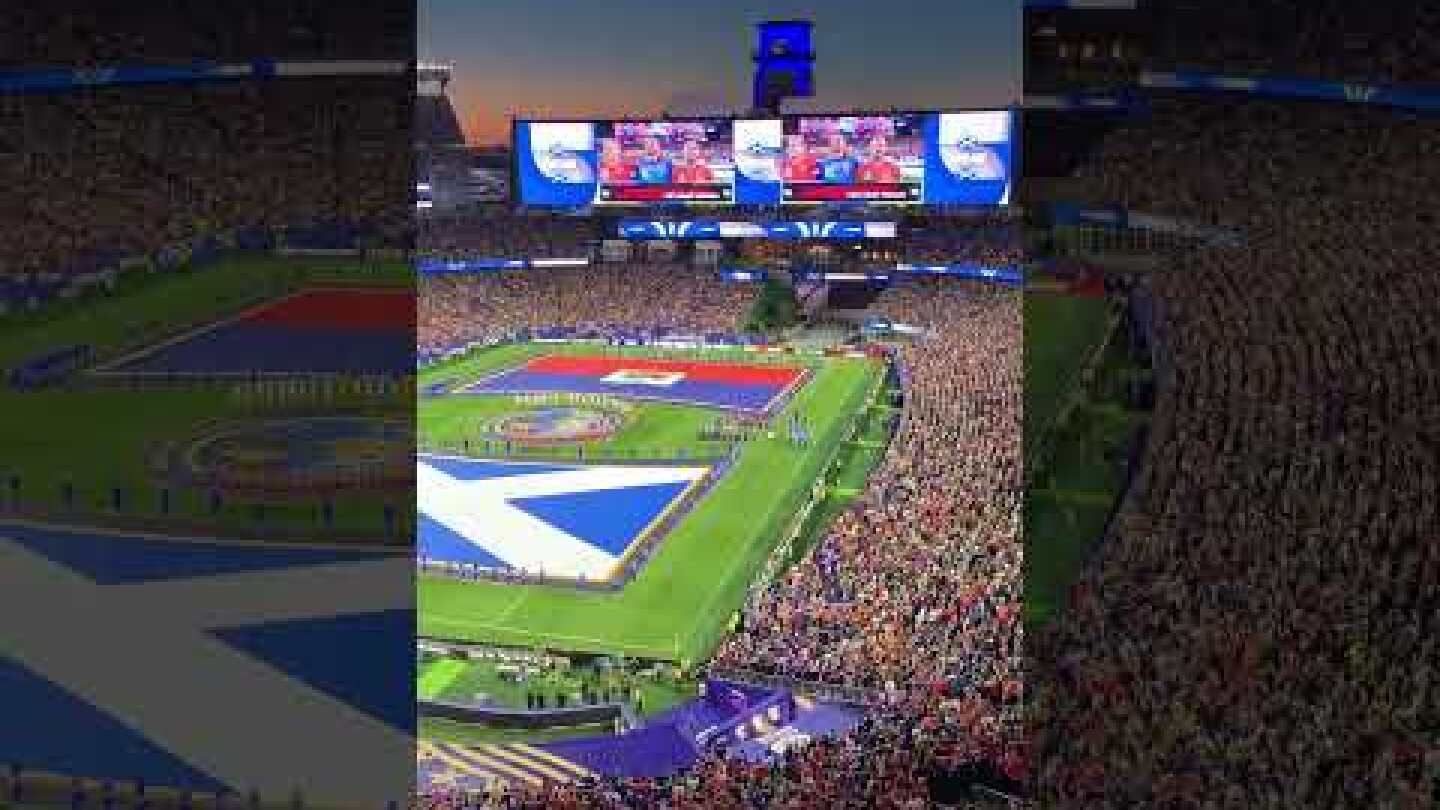 Fans sing the Scottish national anthem during the World Cup at Gillette Stadium