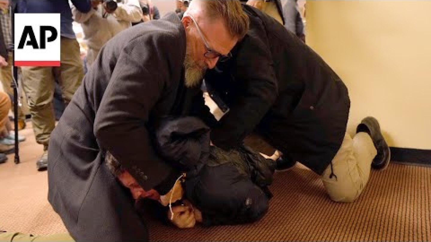 Man tackled after spraying substance on Ilhan Omar at Minneapolis town hall