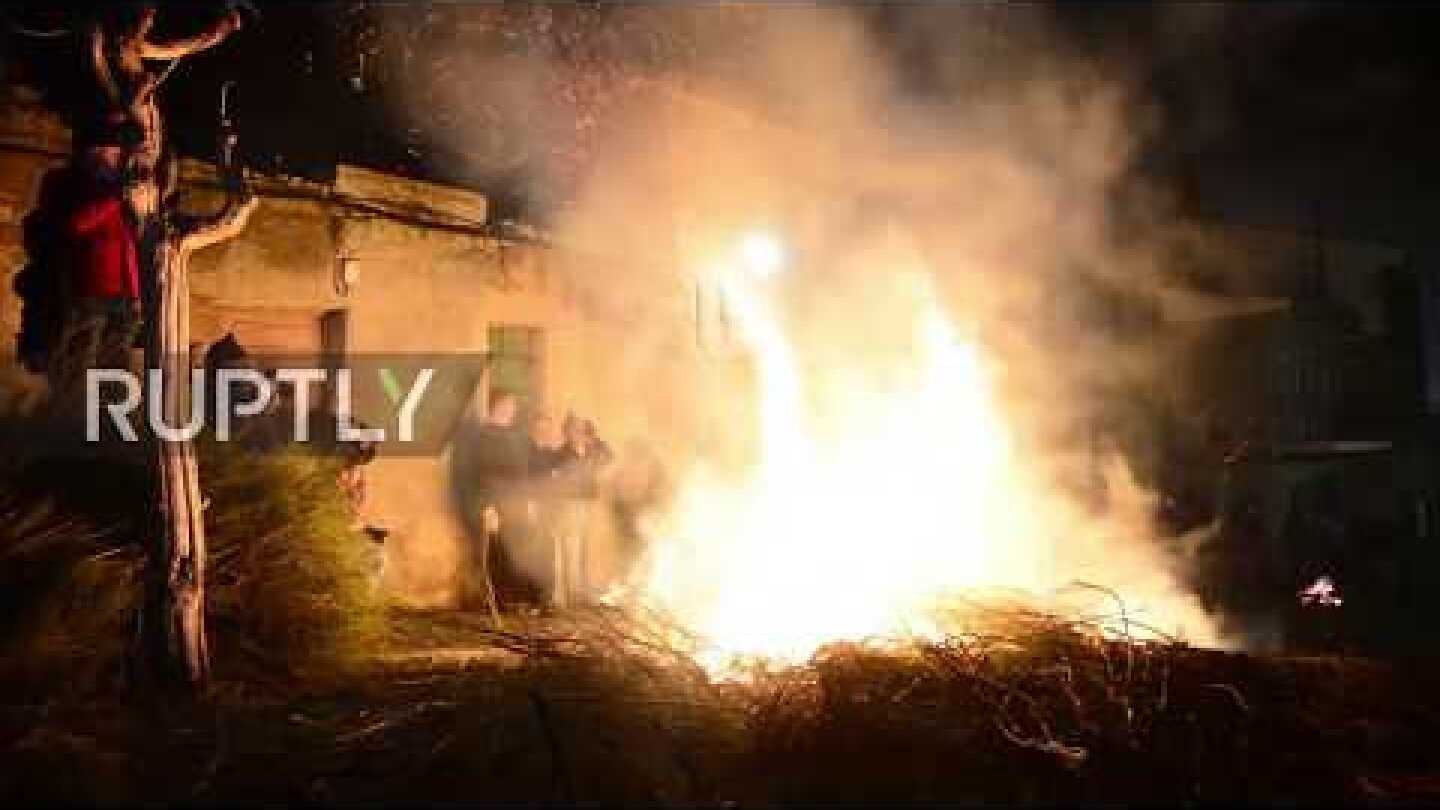 Avila residents ride horses through fire to celebrate San Antonio Abad