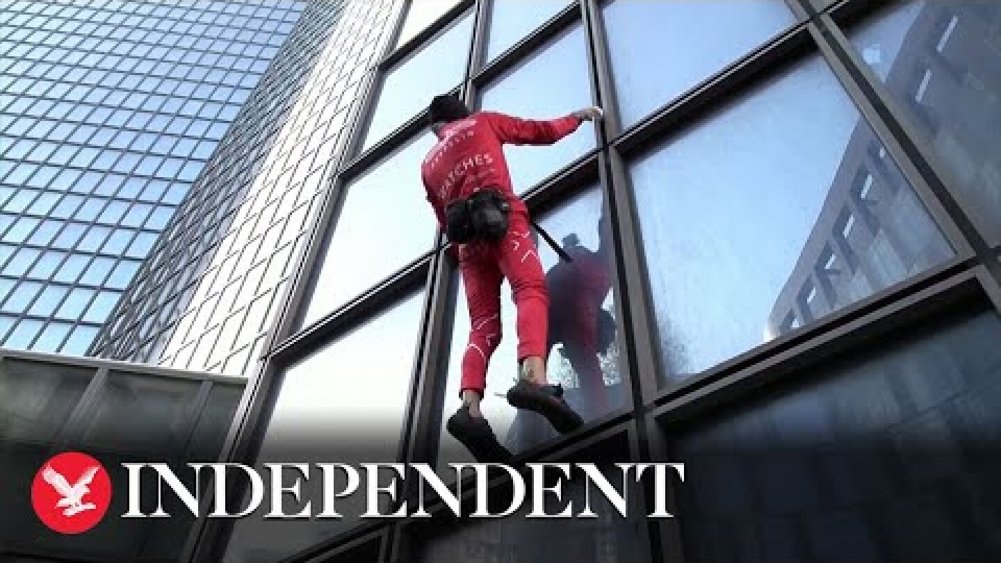 'French Spiderman' climbs Paris skyscraper to mark 60th birthday