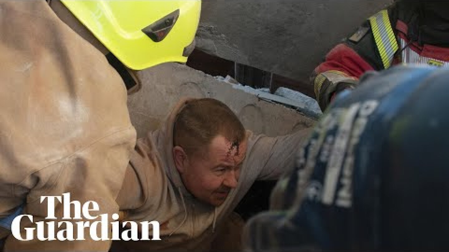 Ukrainian rescuers free man trapped in rubble after Russian shelling in Kharkiv