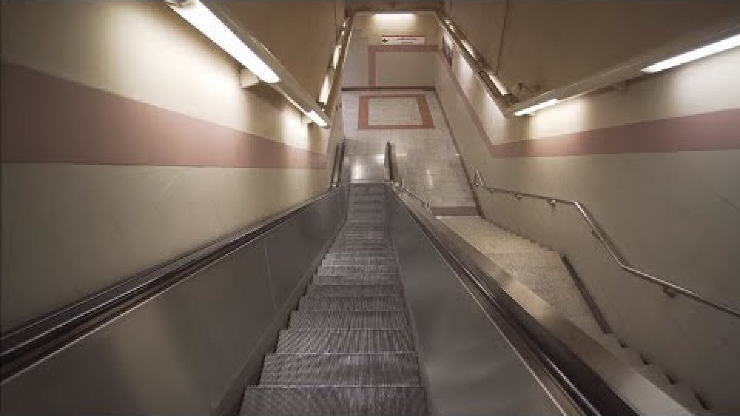 Greece, Athens, Metaxourgeio metro station, 1X escalator - going down to platform level