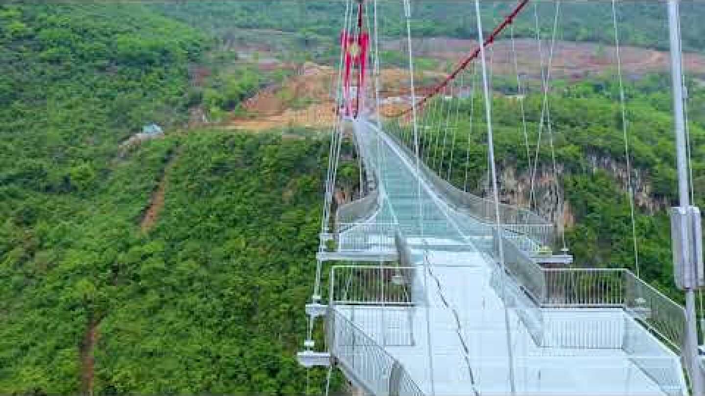 Glass Bridge in Huangchuan Three Gorges Scenic Area