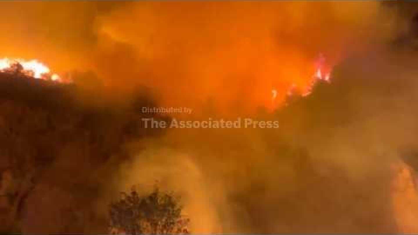 Large wildfire burning near Albania's capital spreads overnight prompting evacuations