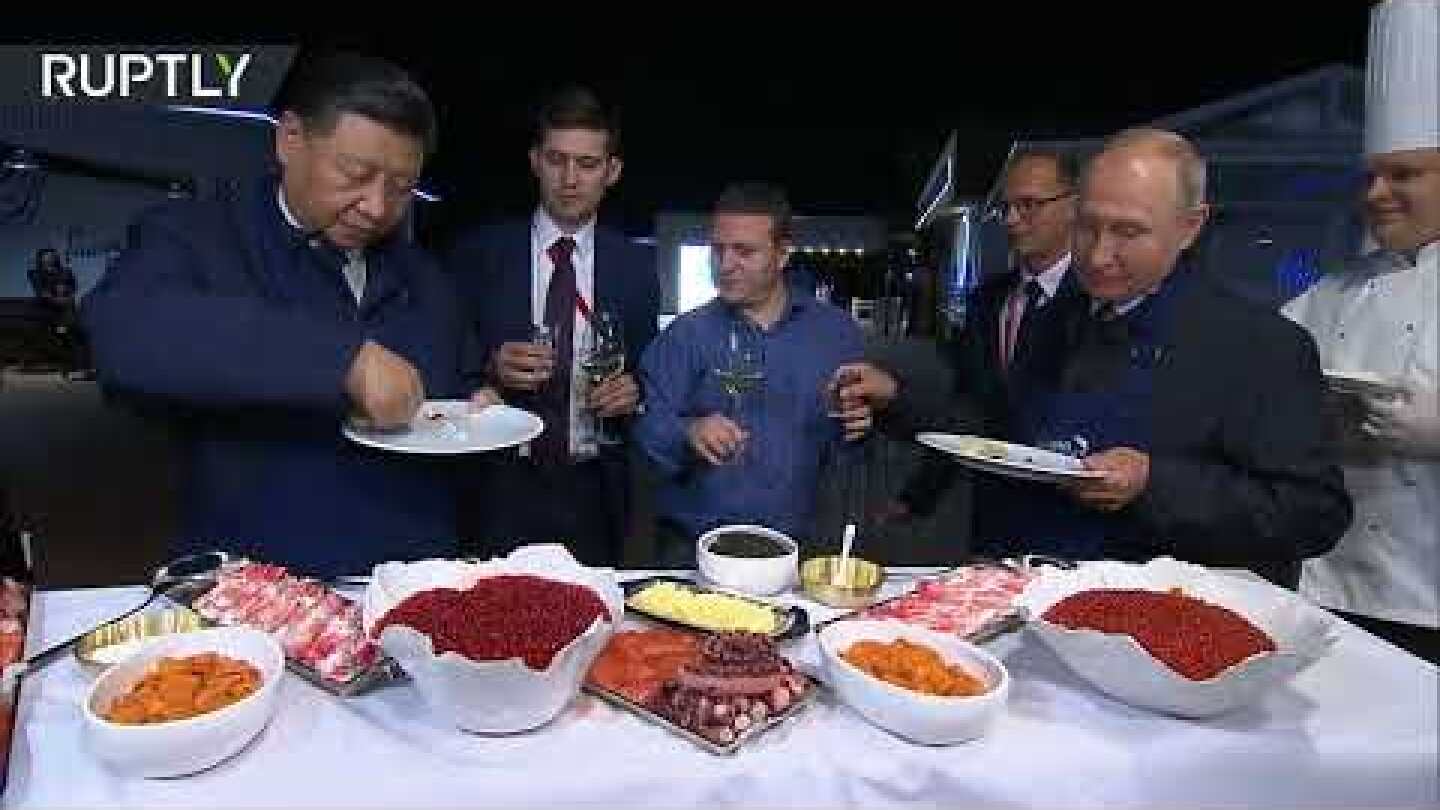 Pancakes, caviar & vodka: Putin and Xi get a taste of Russian cuisine
