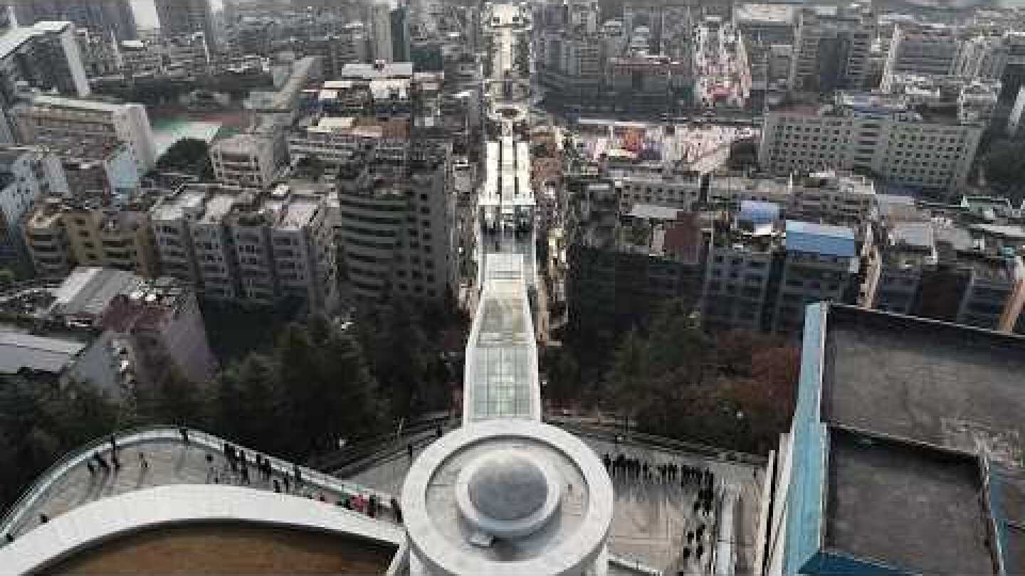 905-meter escalator system begins trial operation in China's Chongqing