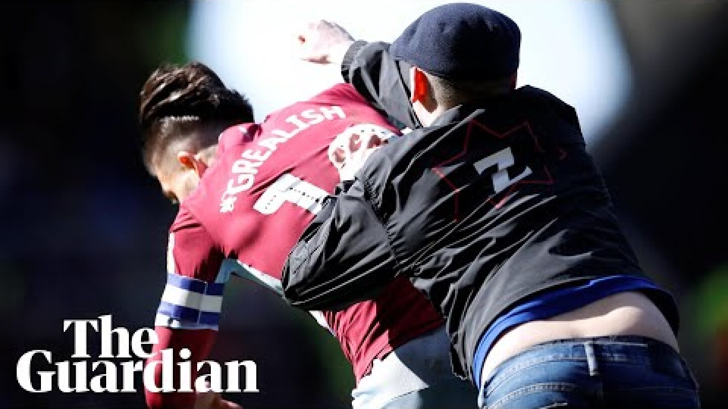 Jack Grealish punched by pitch invader during derby clash