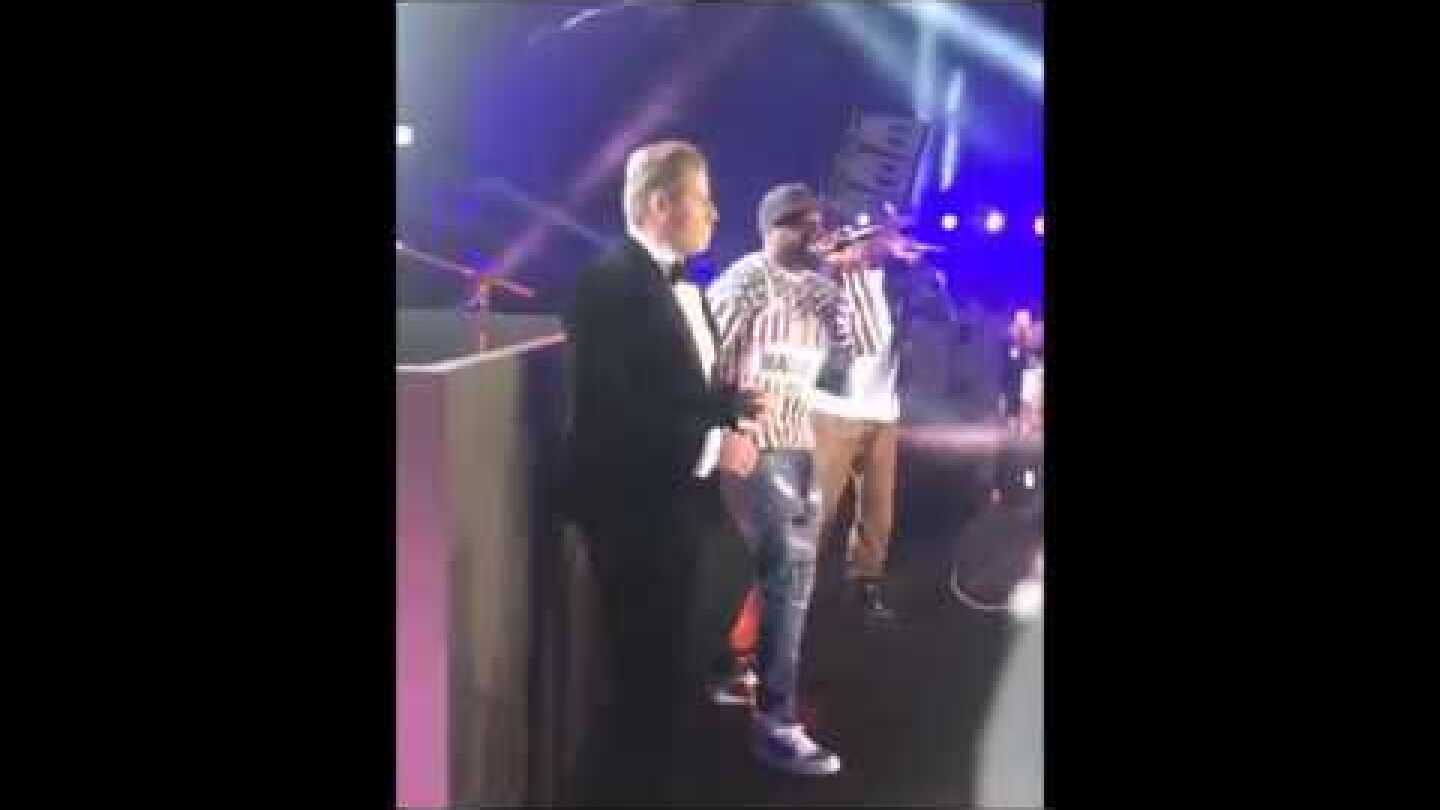 John Travolta Dancing On Stage With 50 Cent At Cannes Film Festival