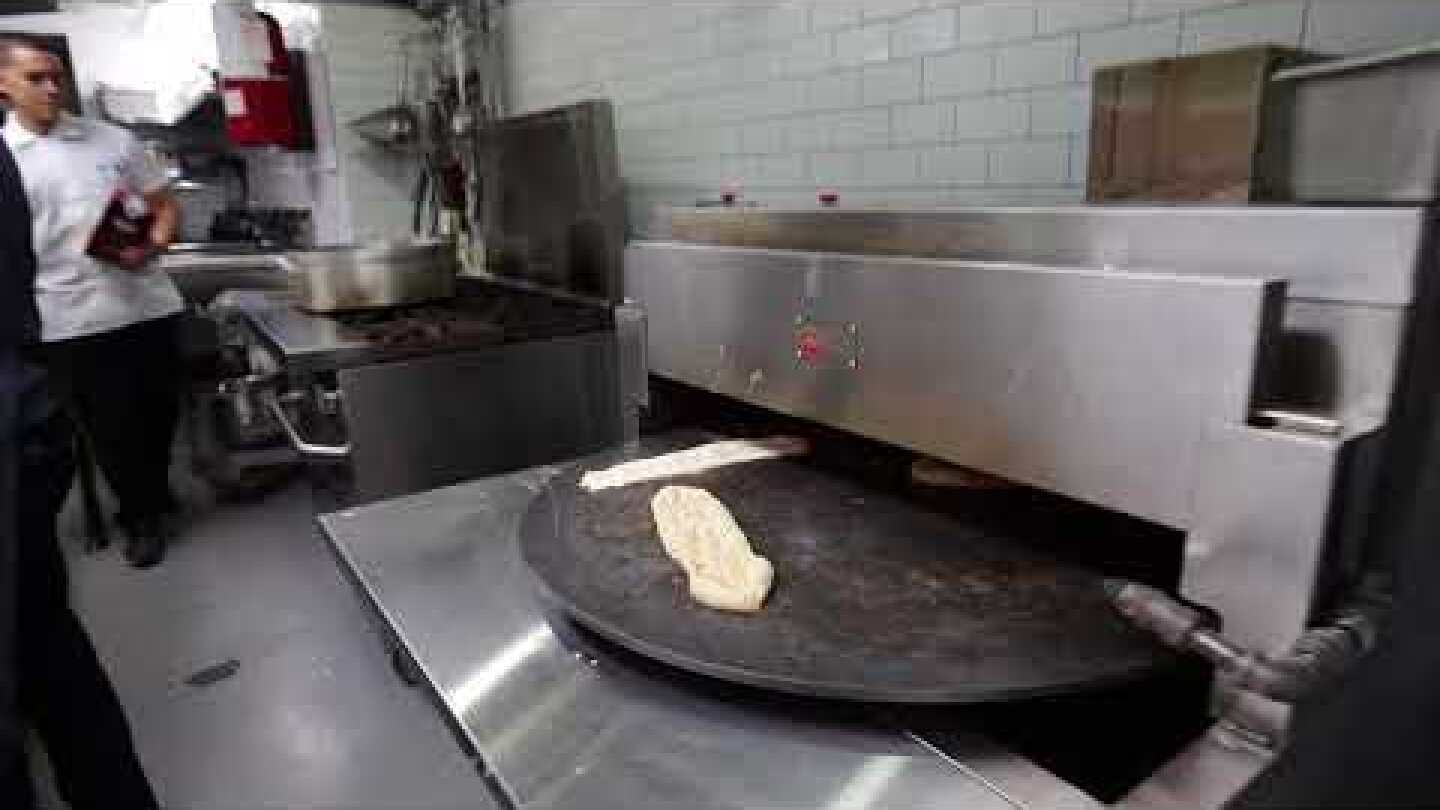 Making the house bread at Sofreh in Prospect Heights