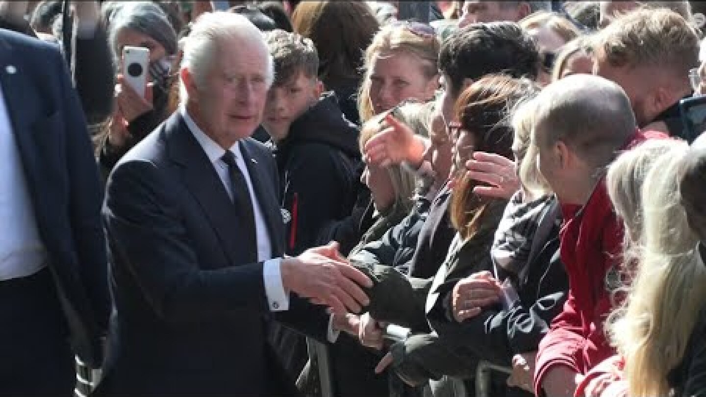 King Charles III and Prince William shake hands on South Bank | AFP