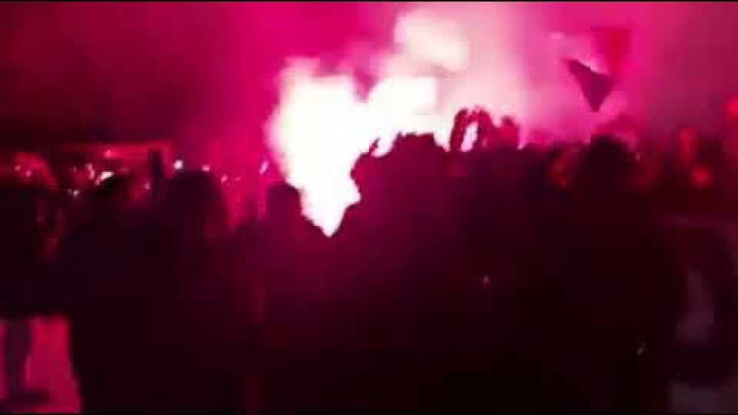 PSG fans welcoming their team bus to the hotel ahead of their Champions League match with Madrid