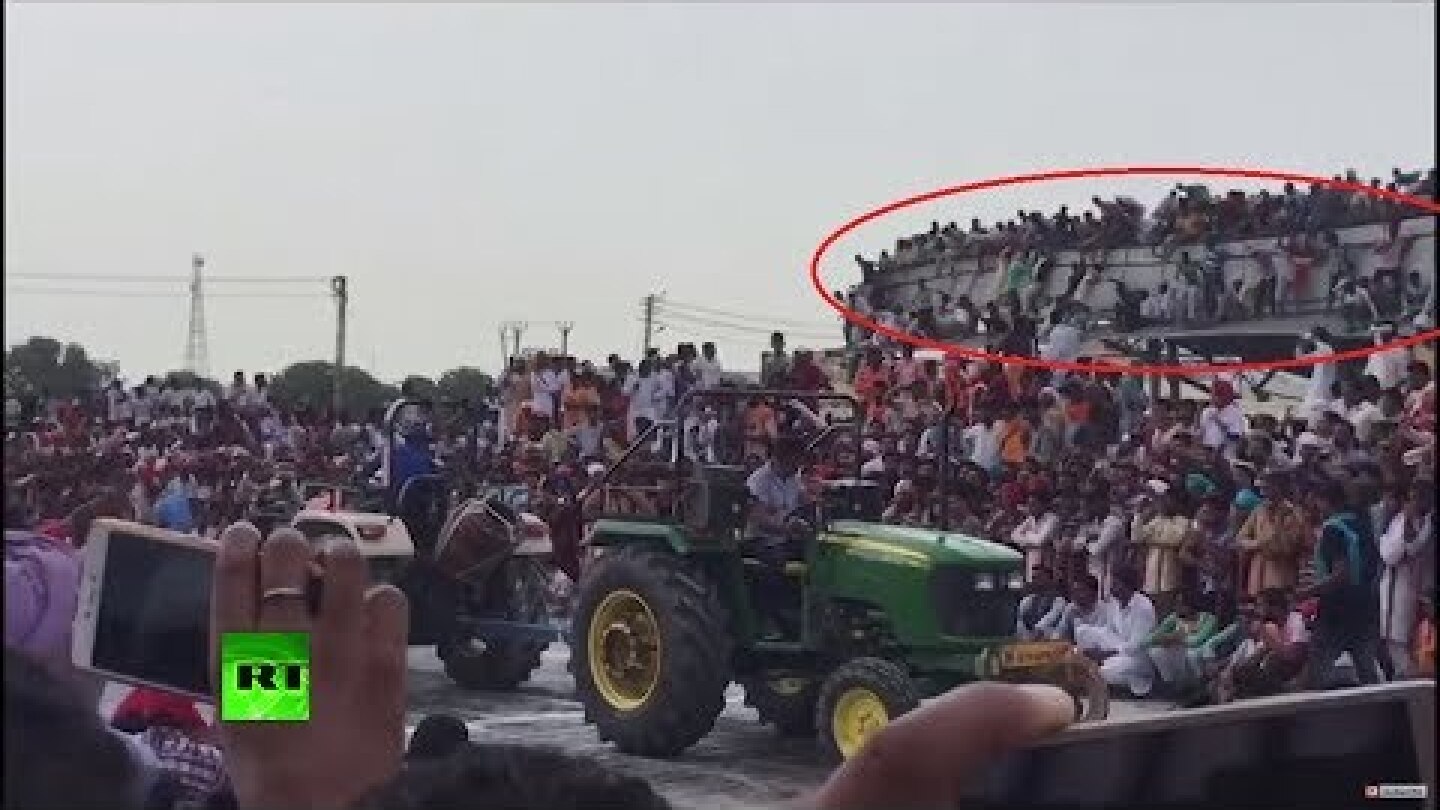 Moment tin shed collapses with dozens of people on roof in India