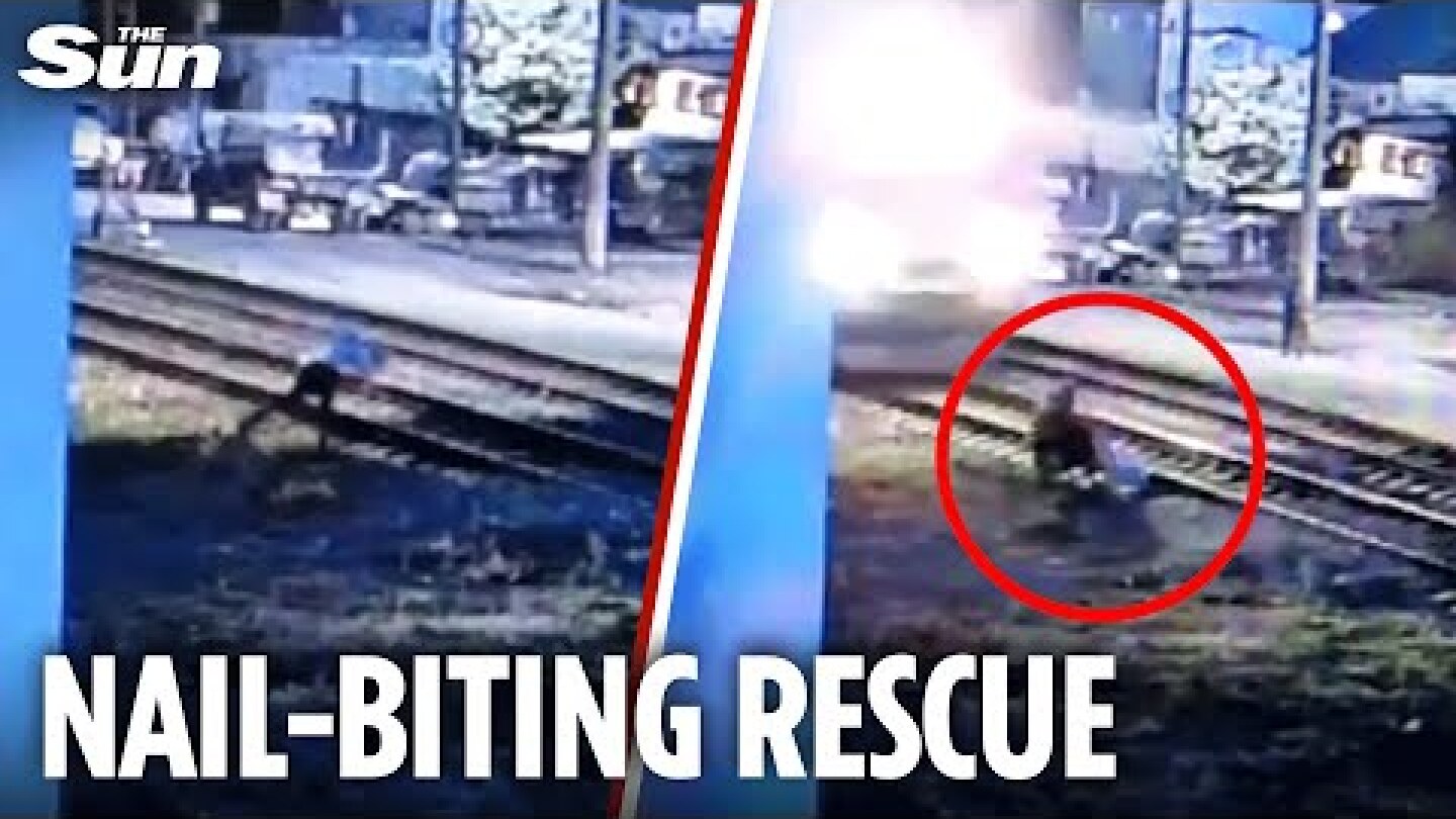 Heart-stopping moment hero runs in front of train to rescue man collapsed on track