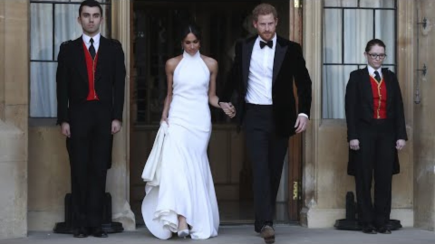 Duke and Duchess of Sussex depart in Jaguar for wedding reception