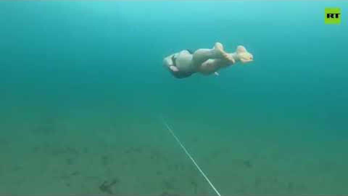 That’s a world record! Longest swim beneath Lake Baikal’s ice