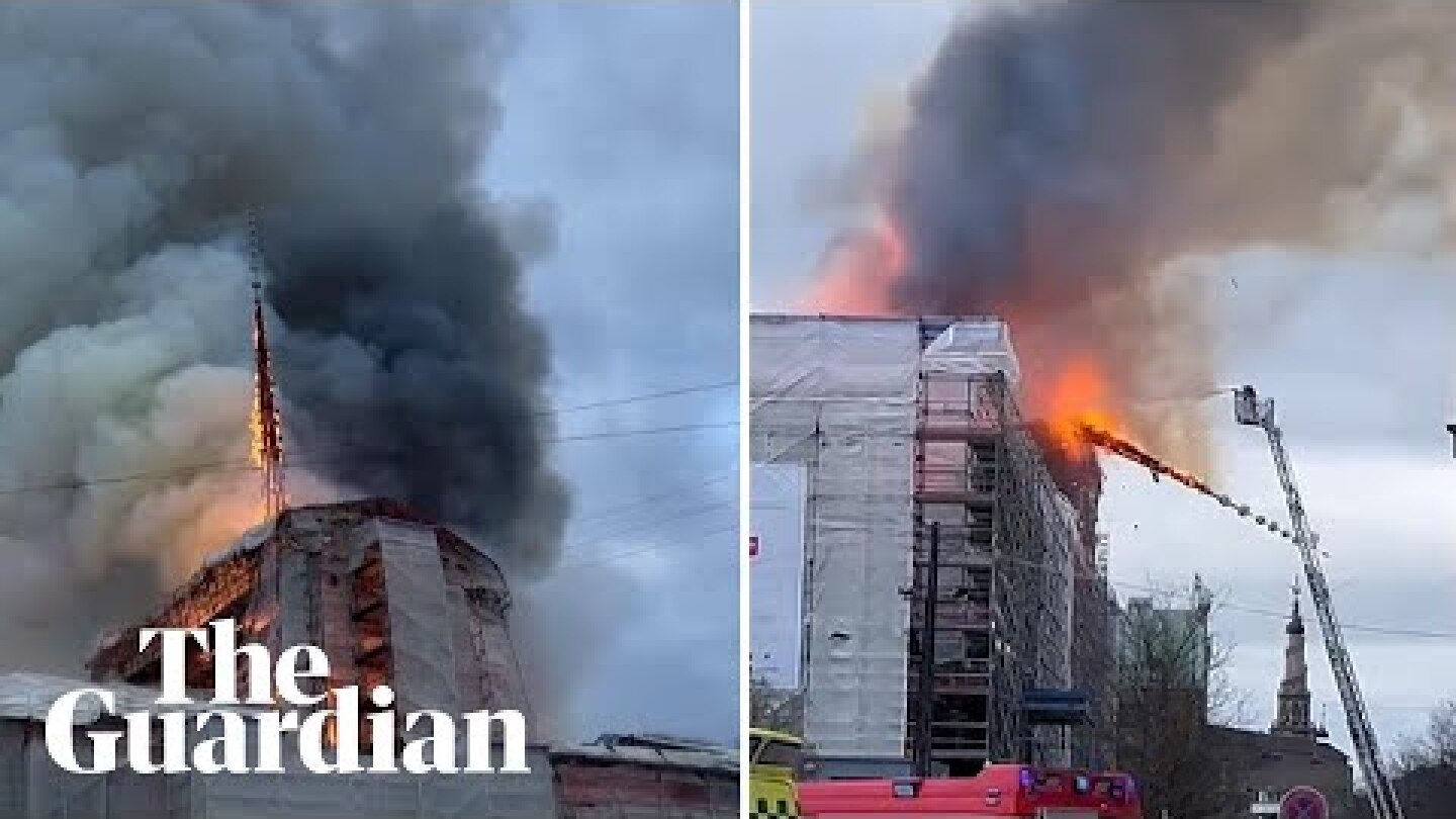 Moment spire collapses at Copenhagen's old stock exchange