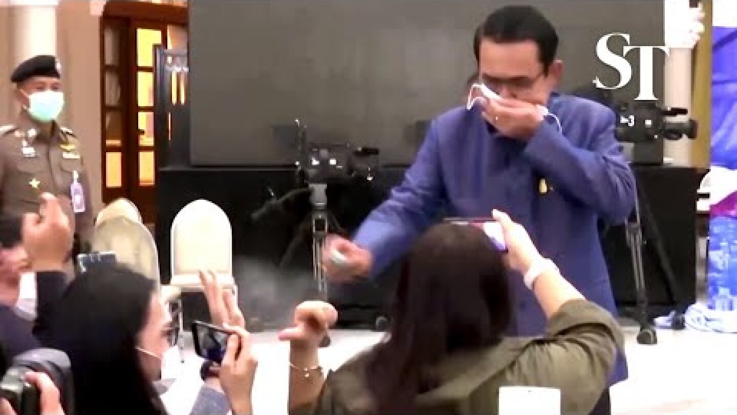 Thai PM sprays sanitiser on journalists to avoid questions