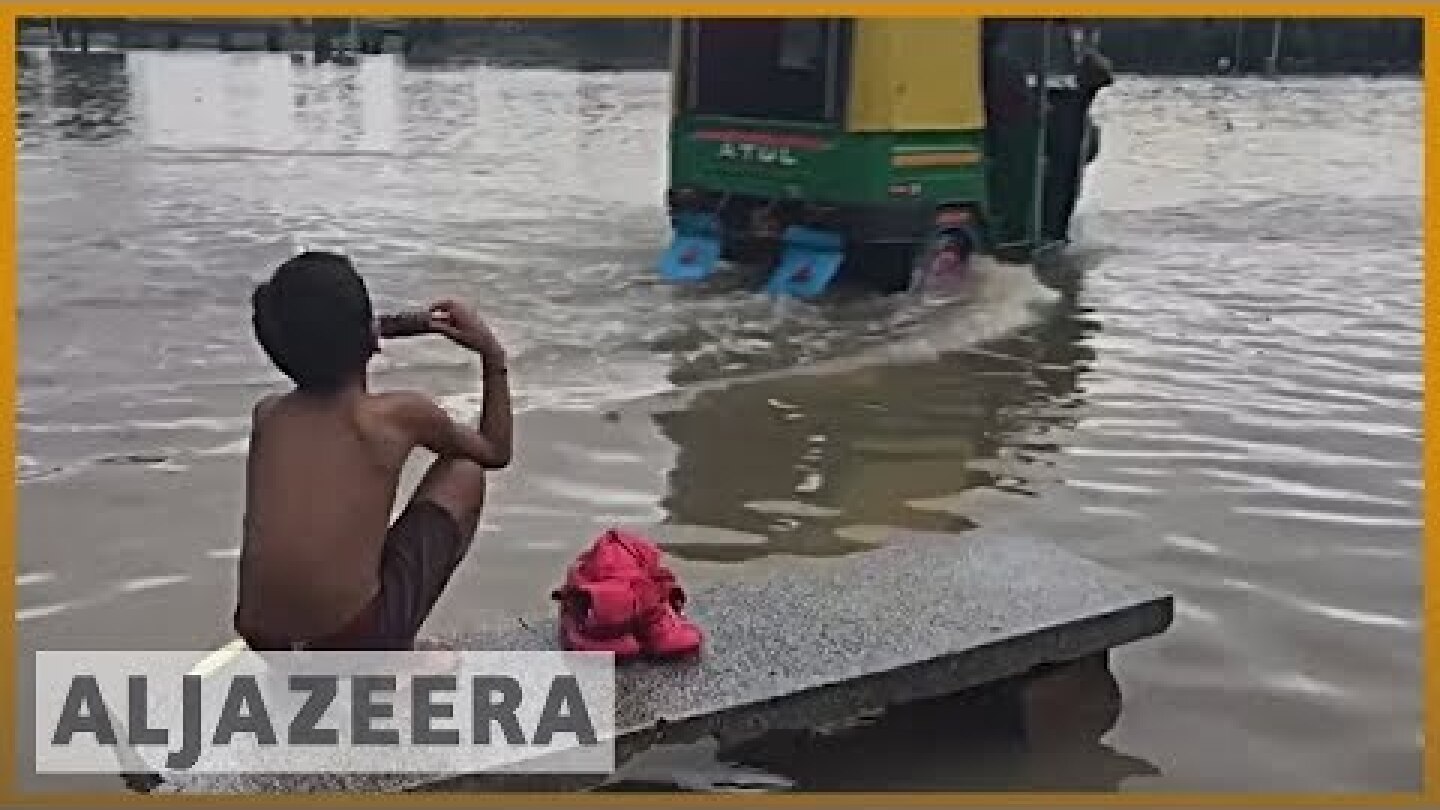 Dozens die in north India floods, thousands evacuated