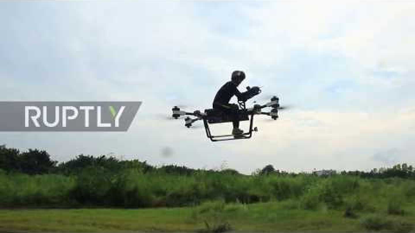 Up, up and away! World's first flying scooter floats over Dongguan