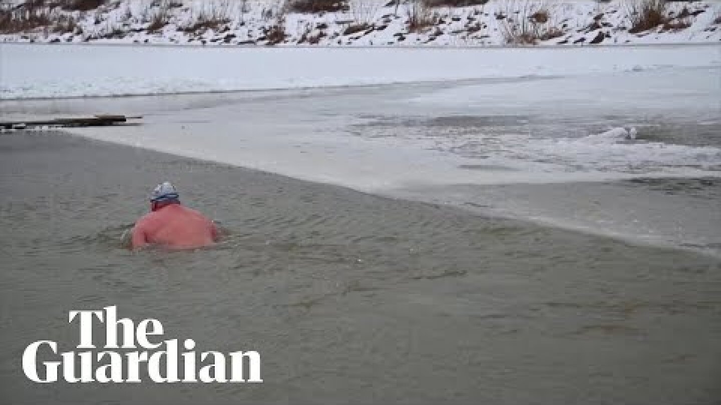 Ice-swimming enthusiasts in Siberia brave the season’s first freezing dip
