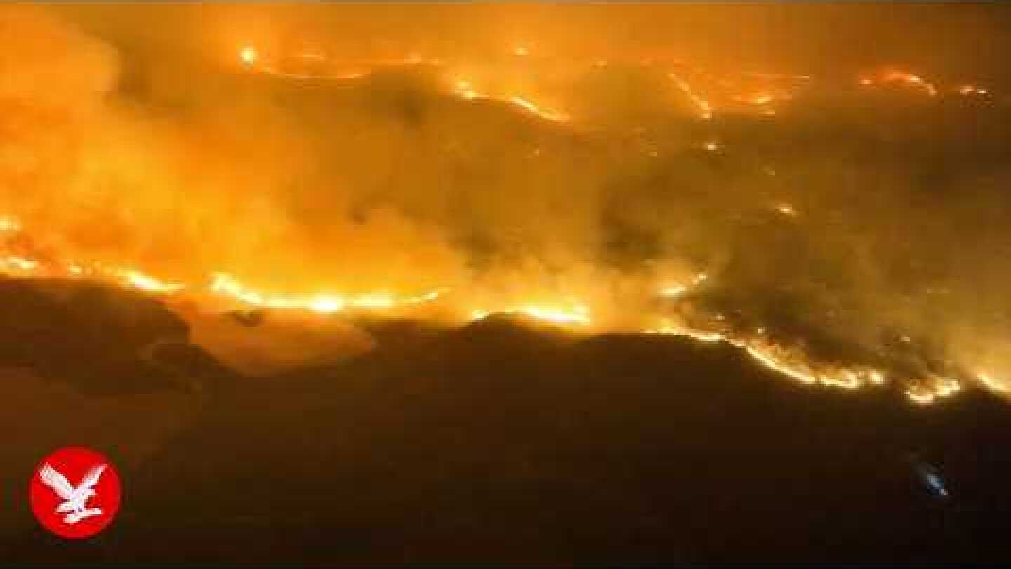 Drone footage shows scale of major wildfire sweeping through northern Spain