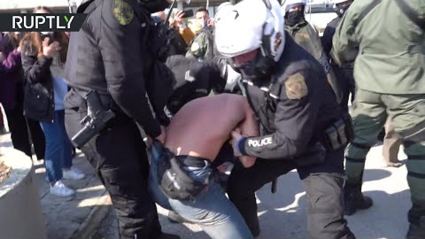 Greece police arrest 30+ people after clashes at security bill protest