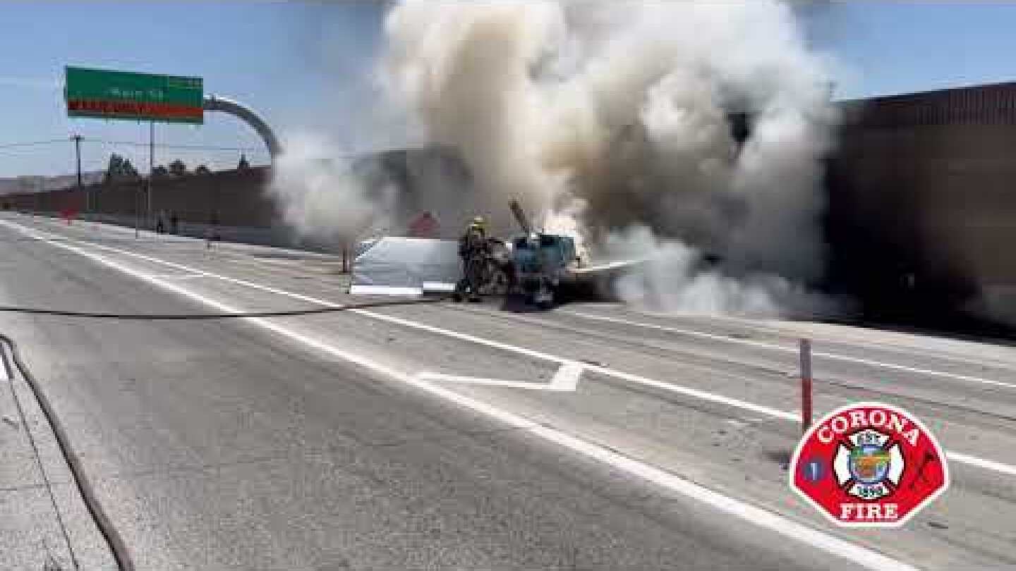 Plane makes crash landing and catches fire on California freeway, both occupants escape