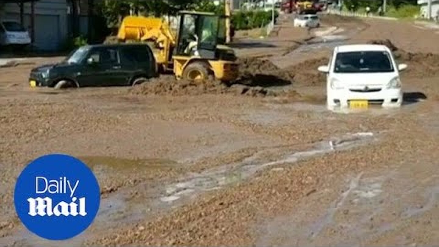 People run into the streets in darkness as 6.7 earthquake hits Japan