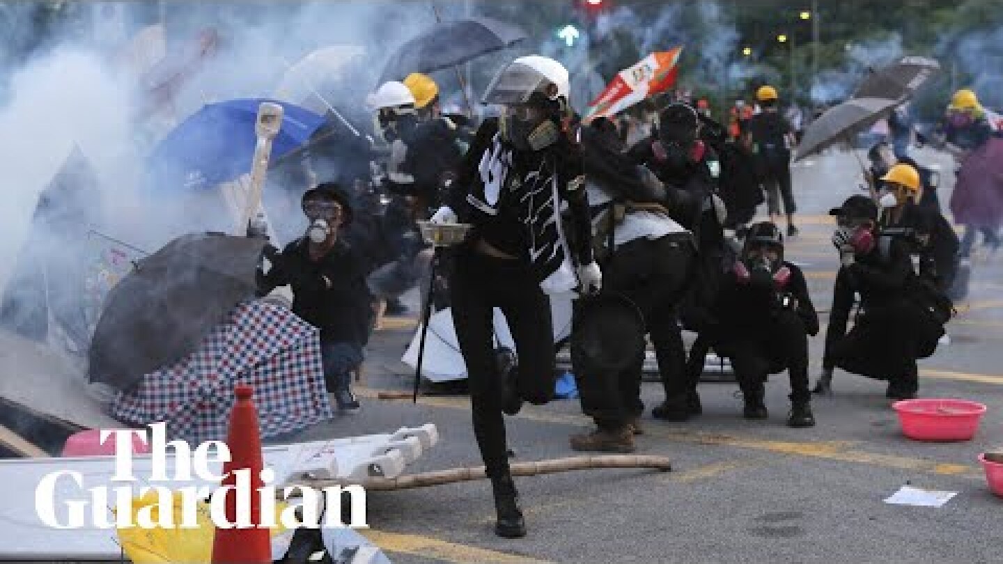 Hong Kong protests: fights break out and police fire teargas