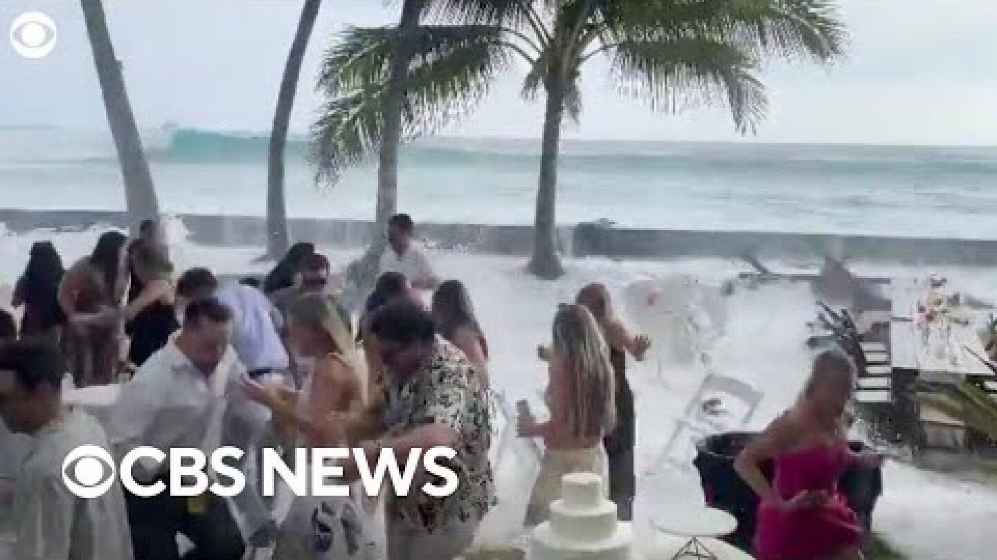 Big wave crashes wedding reception in Hawaii